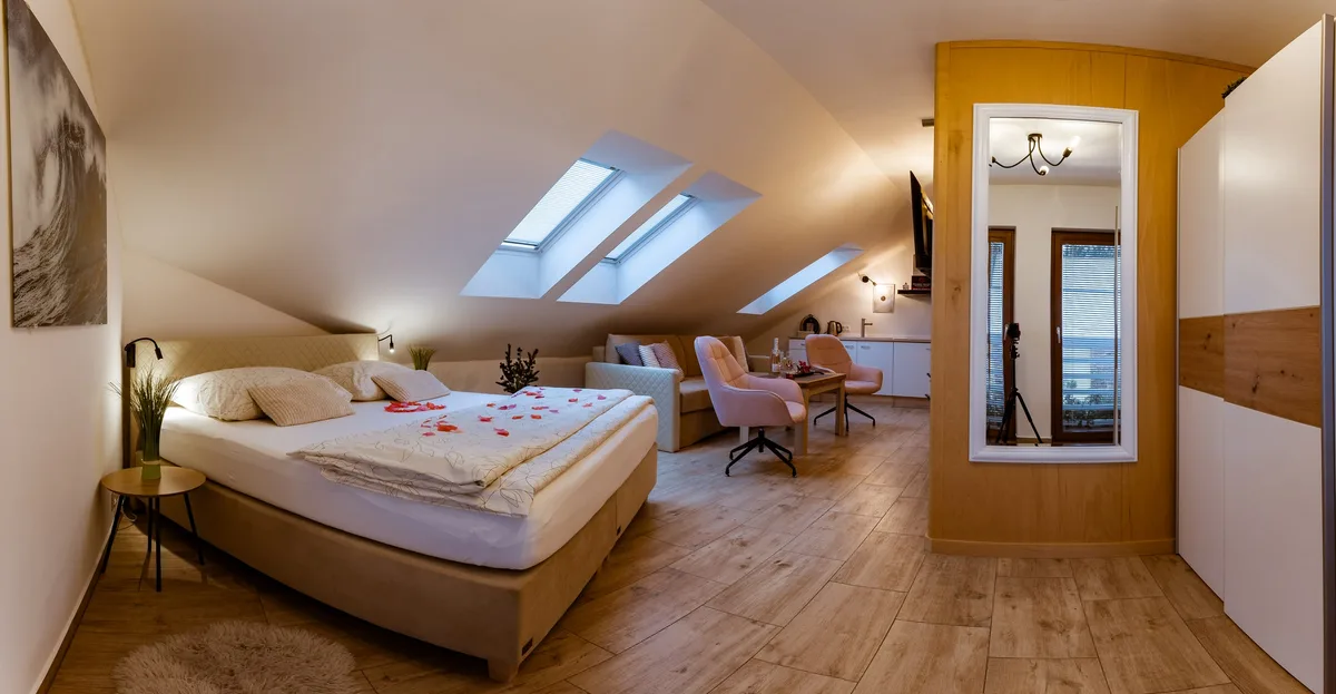 Ložnice apartmánu se střešními okny